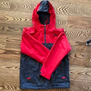 The North Face rain jacket. Great used condition!